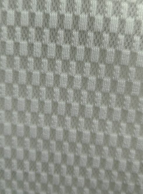 Qual é a vida útil esperada do tecido jacquard de poliéster resistente ao desgaste para diferentes aplicações de estofamento?